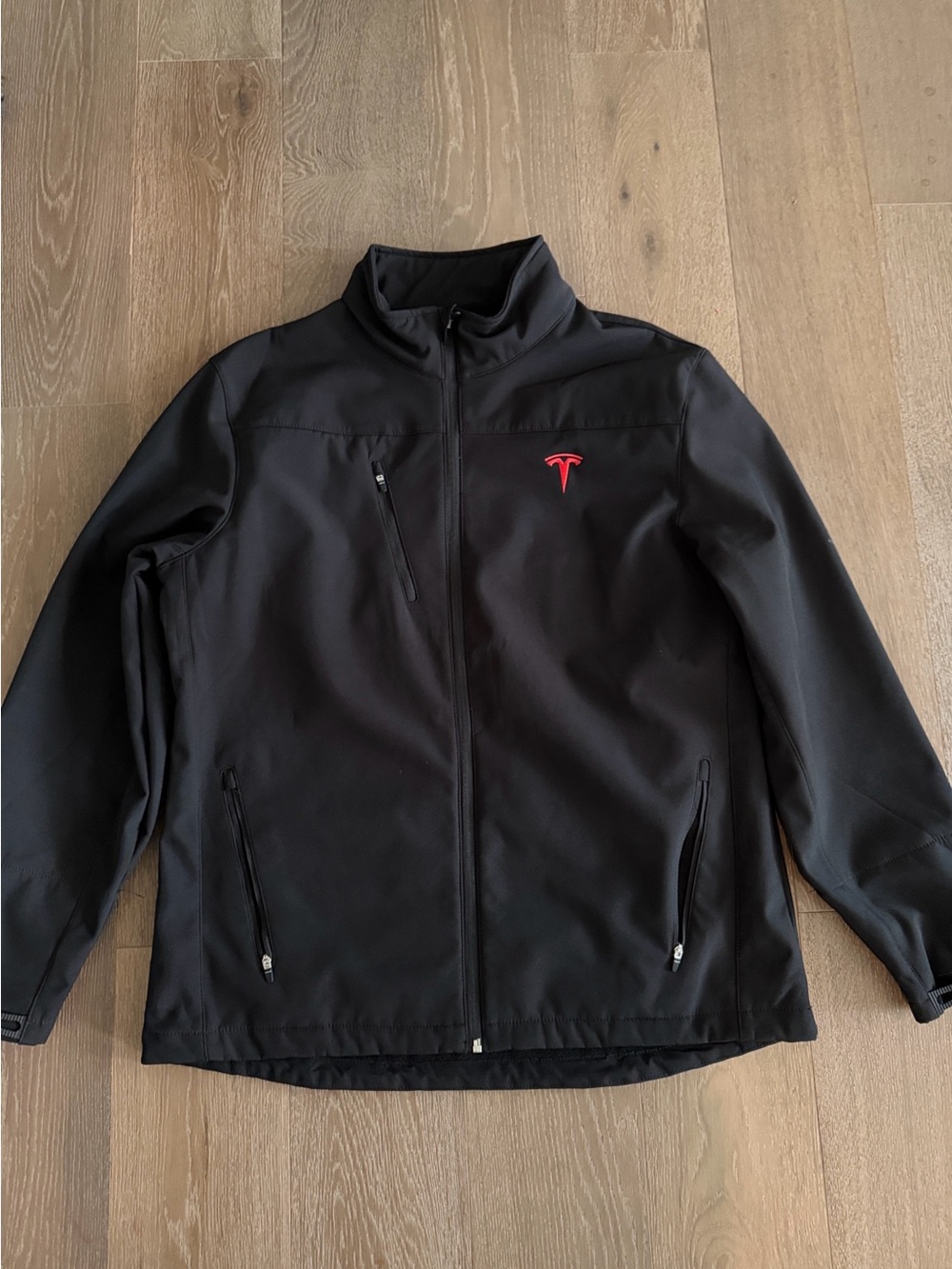 Men’s black Tesla Jacket. Size: Large. Like New.